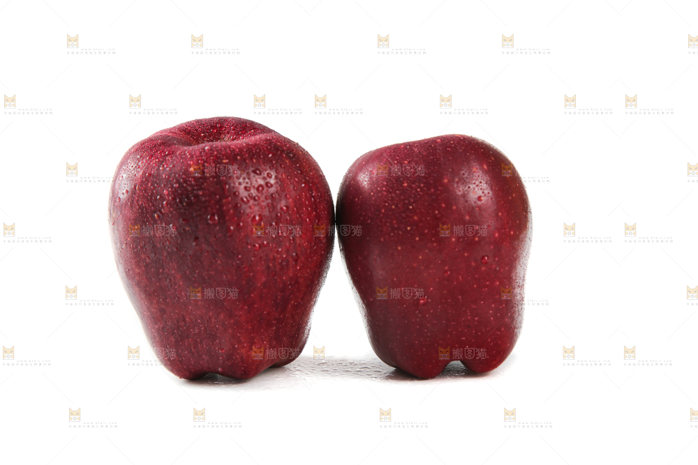 白底上放着花牛苹果