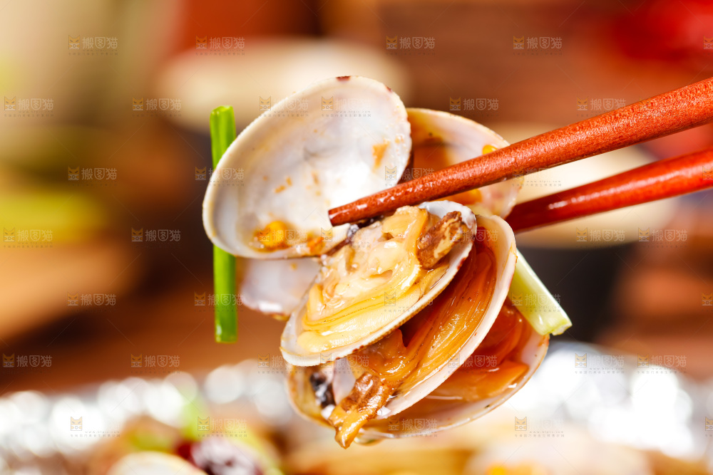筷子夹着的花甲