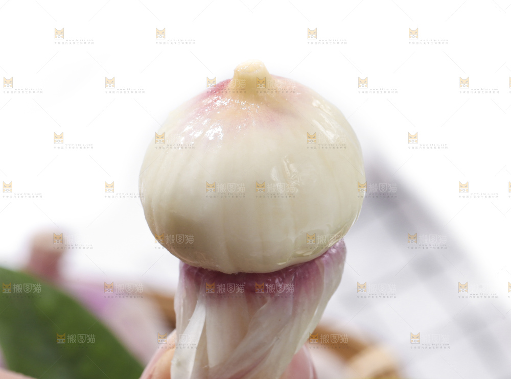 手里拿着独蒜头