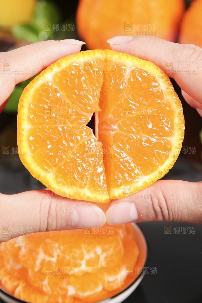 手里拿着不知火柑橘
