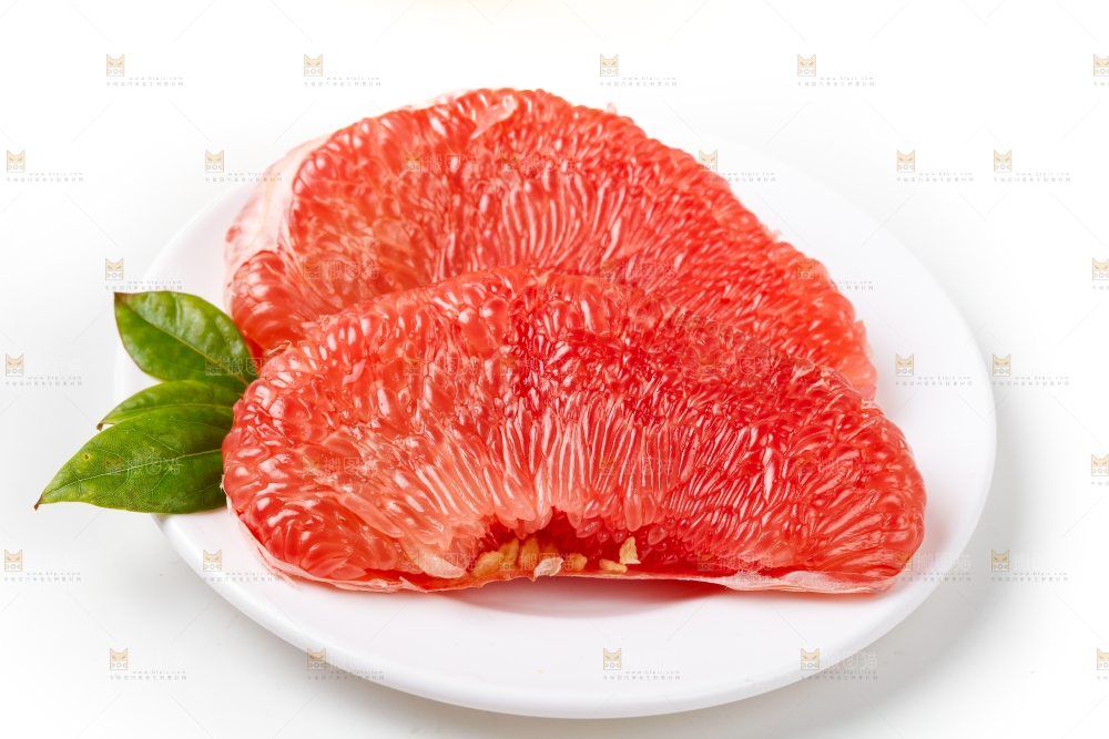 白底上一堆海南红心蜜柚