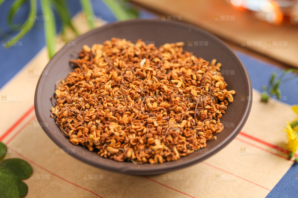 信纸上的一盘干桂花