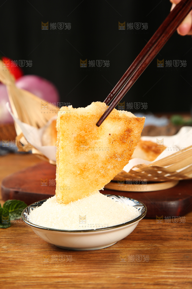 筷子上夹着黄金糯米糍粑