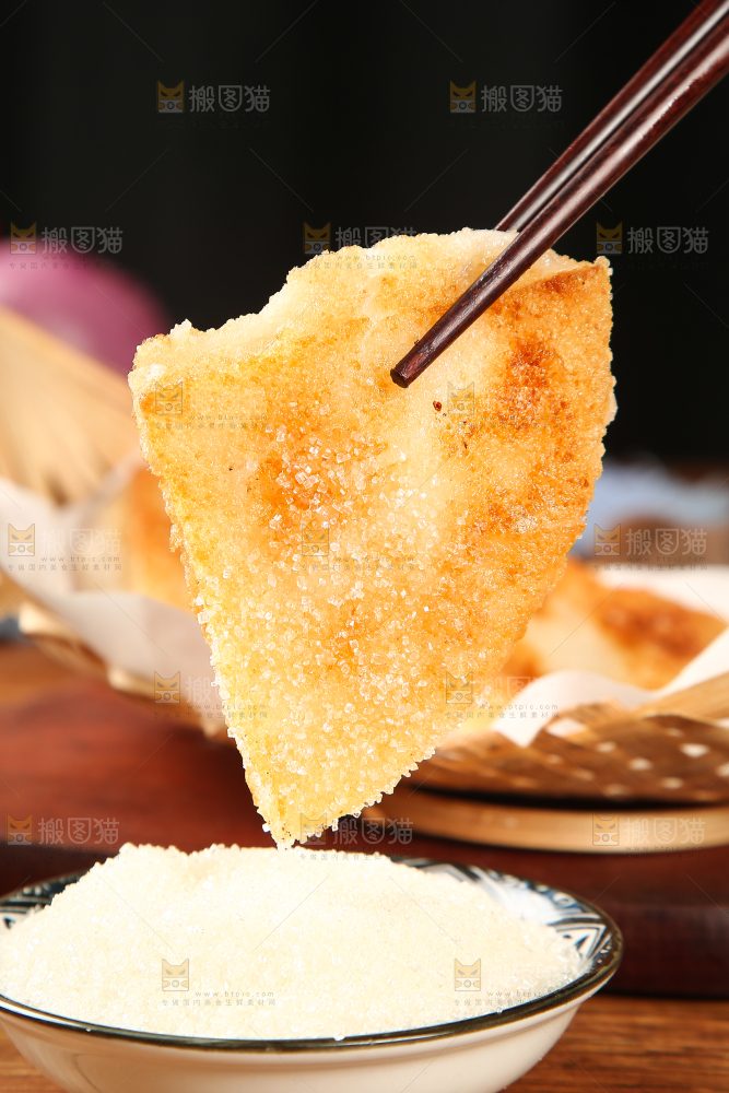 筷子上夹着黄金糯米糍粑