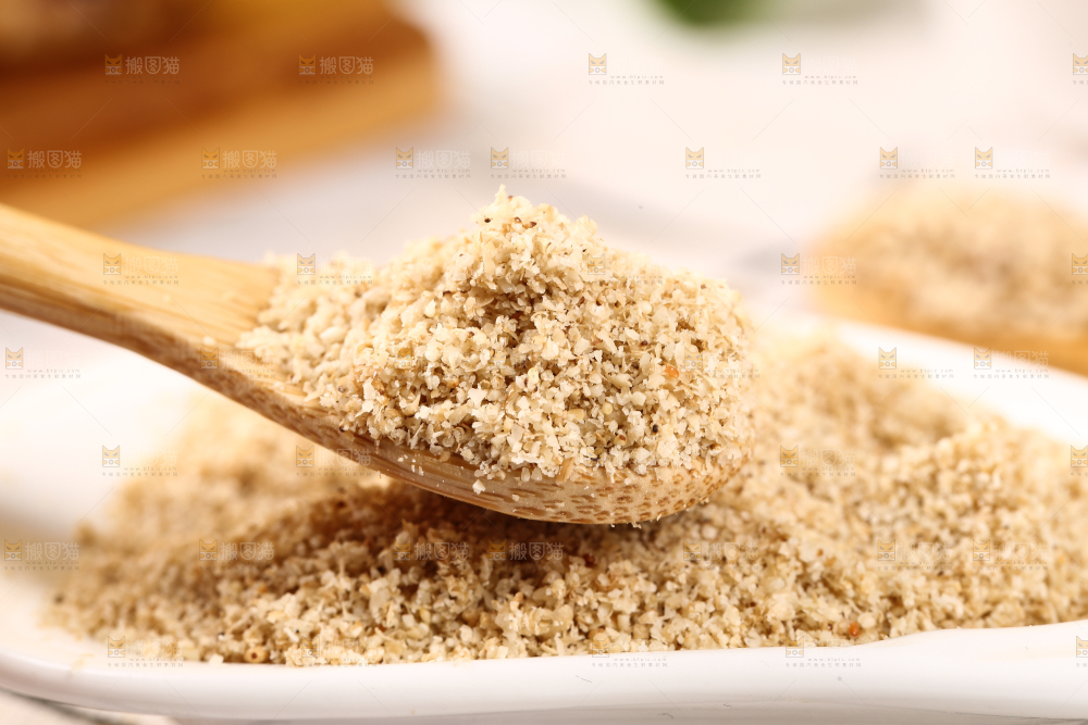 勺子上舀着白芝麻粉