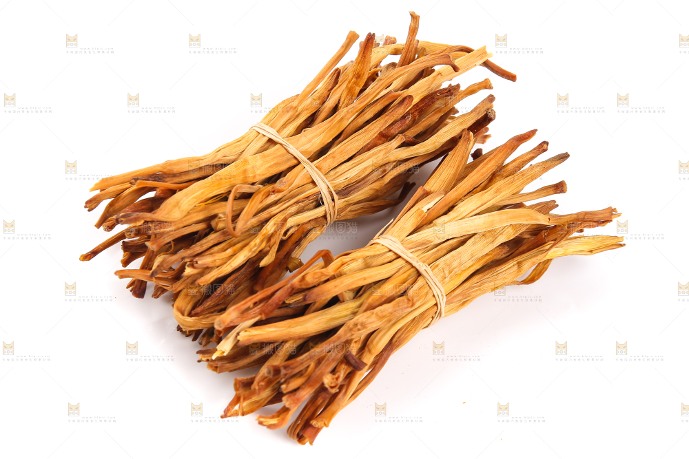 白底上摆放的干黄花