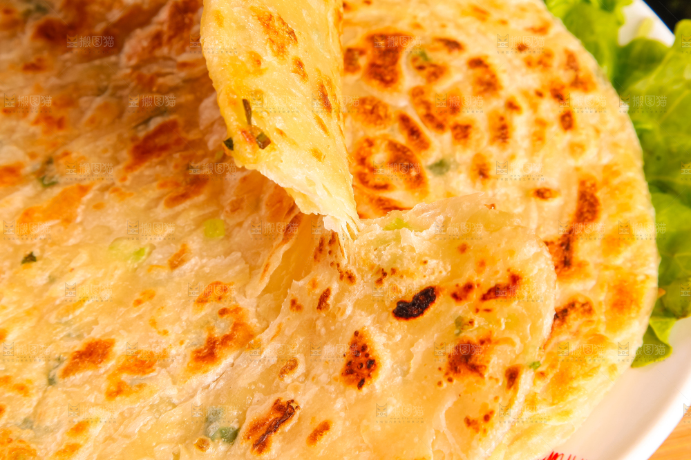 盘子里的煎手抓饼