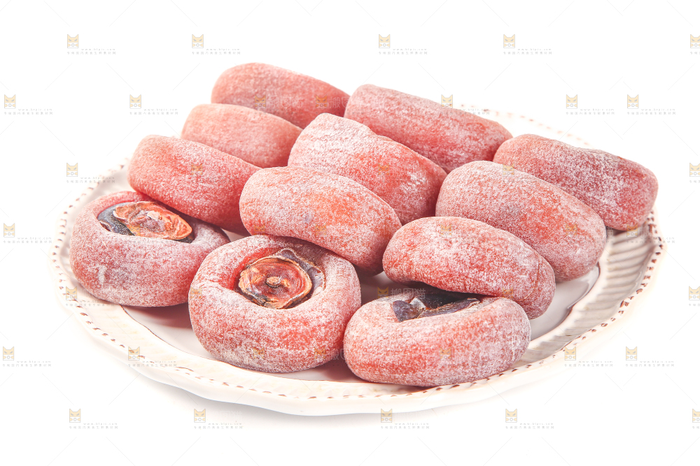 白底上放着一盘圆柿饼