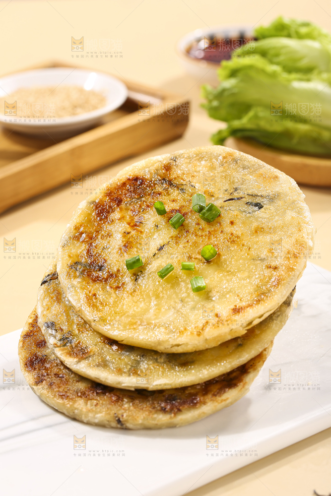 浅底上的梅干菜饼