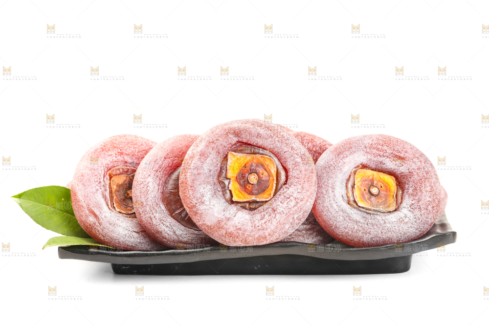 白底上摆放着柿子饼