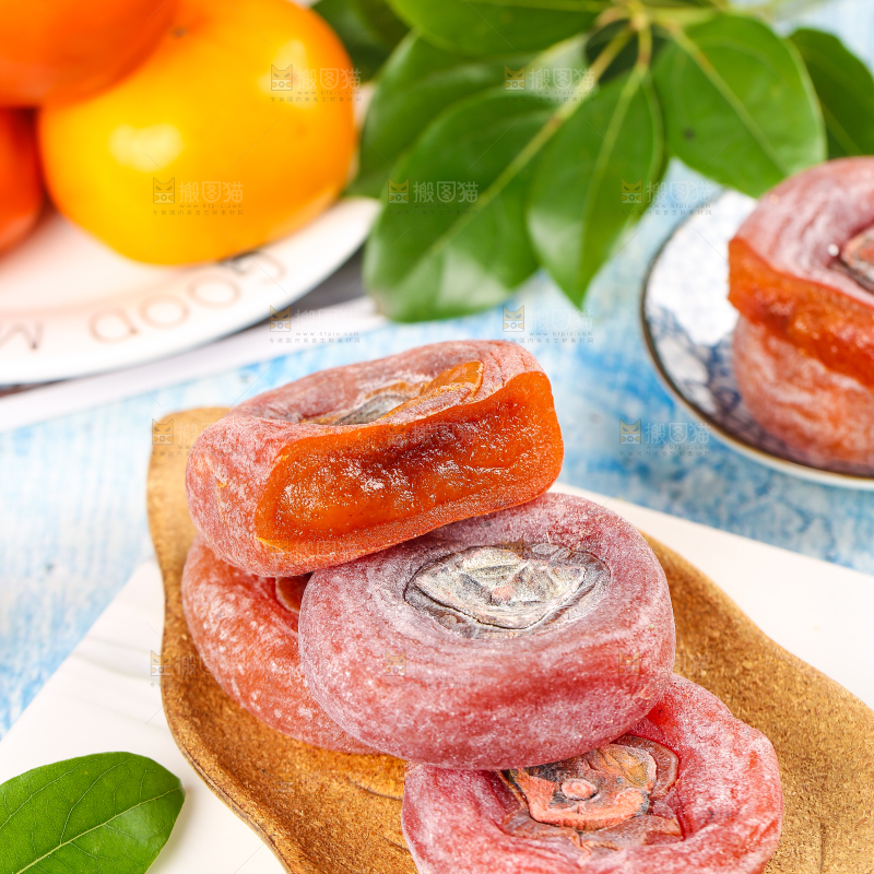 白石板上一盘富平柿饼