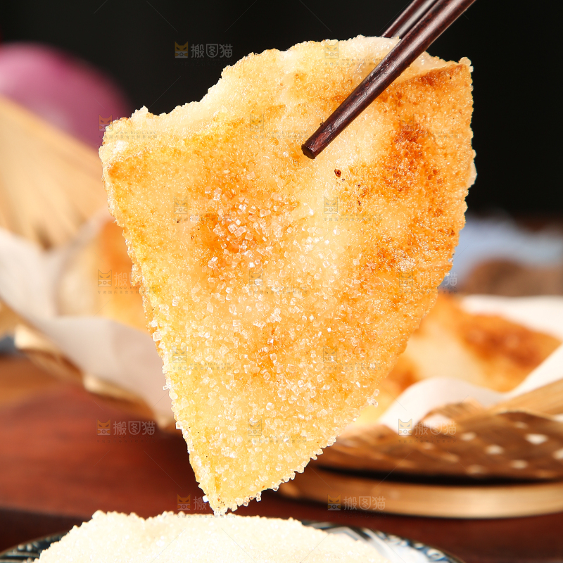 筷子上夹着黄金糯米糍粑