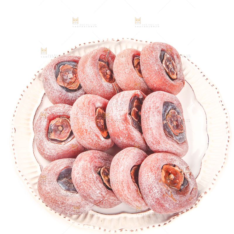 白底上放着一盘圆柿饼