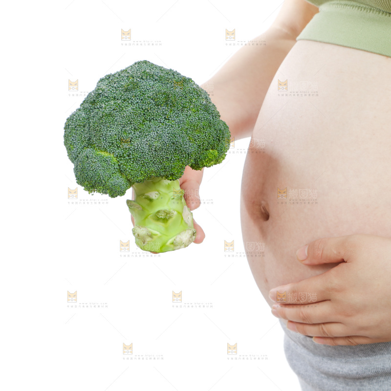 孕妇手里拿着西兰花